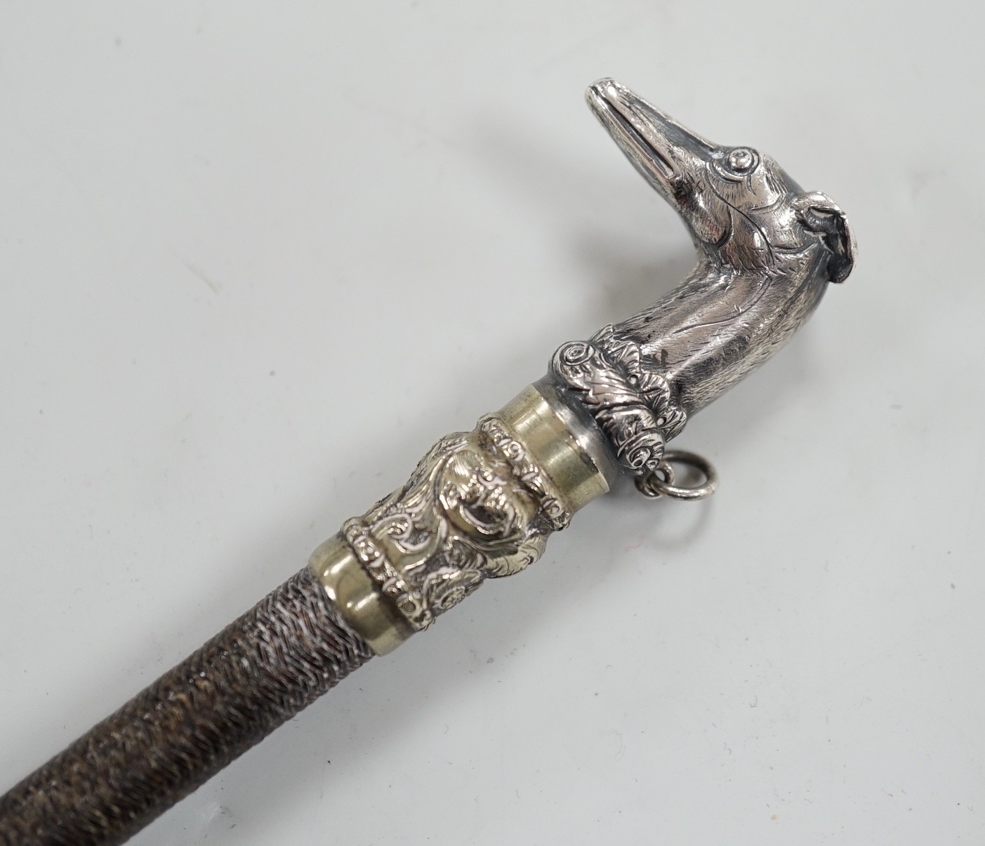 A ‘whippet head’ riding crop or whip. 77cm long